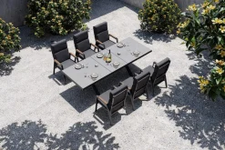 OUTFLEXX Serro Garten-Essgruppe, schwarz/anthrazit, Alu/Steinimitat/Teak, Tisch 200/260 x 100 cm, ausziehbar, 6 Stapelsessel